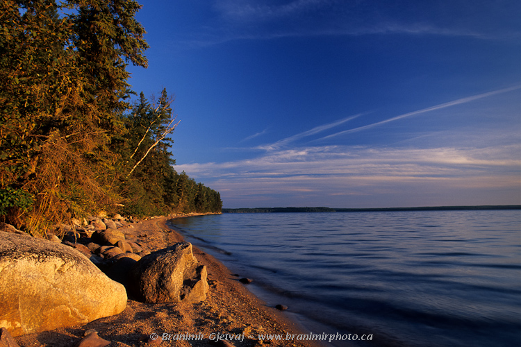 Sandy beach on Waskesiu Lake at sunset, Prince Albert National Park, Saskatchewan