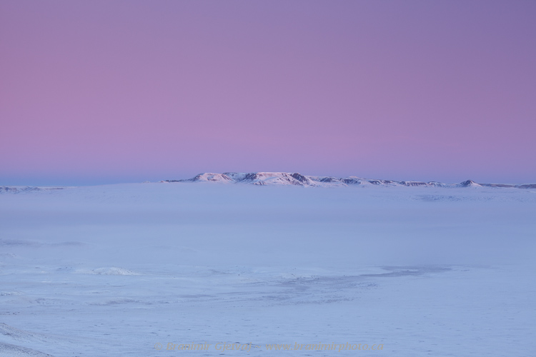 Misty sunrise over Frenchman River Valley and 70 Mile Butte, Grasslands National Park (West Block), Saskatchewan