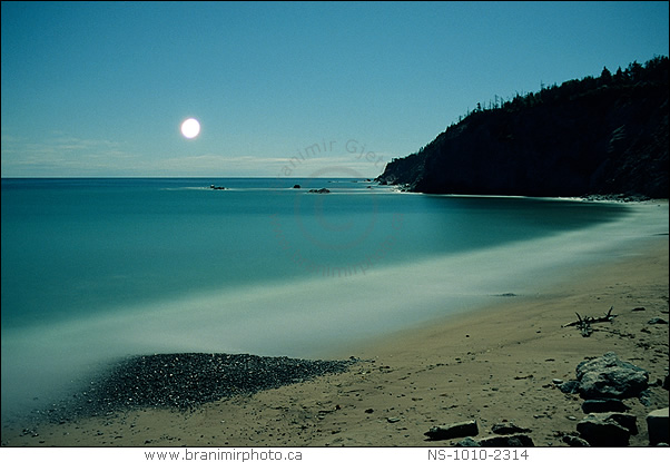 Moonrise over sandy beach, Cape Breton