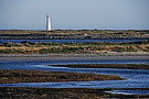 Lighthouse with coastal area at low tide, Cape Sable Island, Nova Scotia