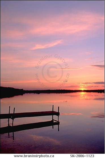 boat dock on Wakaw lake at sunset, Saskatchewan