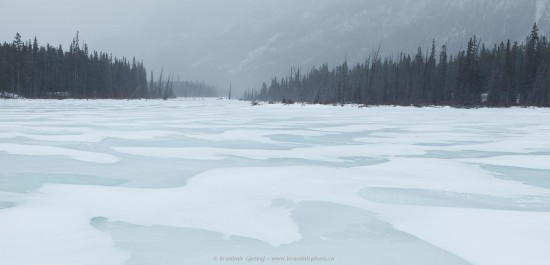 Frozen lake in snow blizzard, Kootenay Plains, Alberta