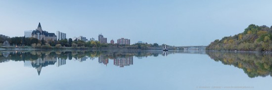 Saskatoon skyline reflecting in South Saskatchewan River